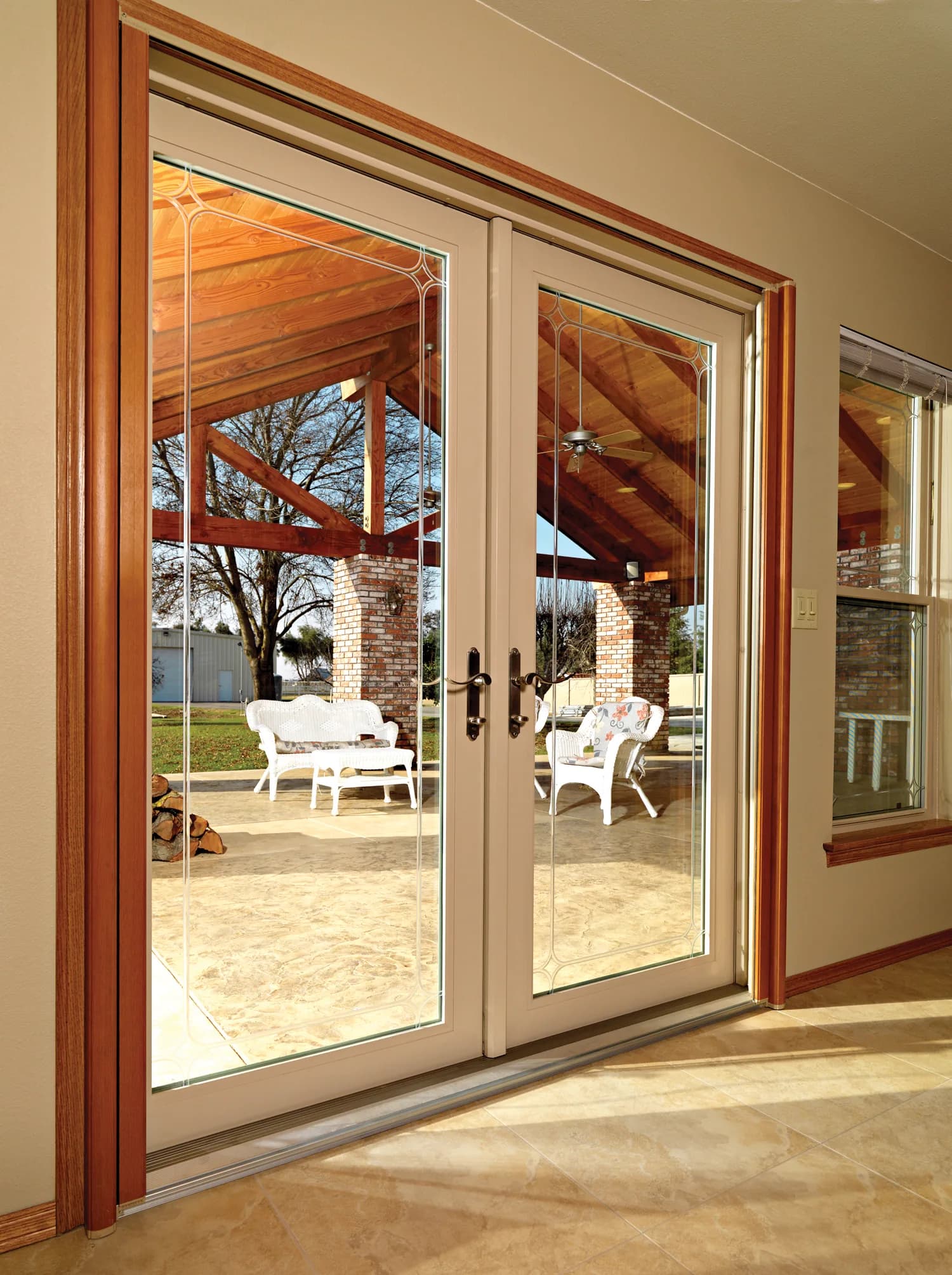 Anlin Malibu Series sliding patio door opening onto a covered patio