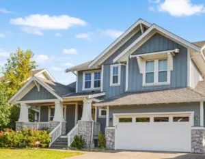 Blue two-story home in Temple, TX with upgraded windows
